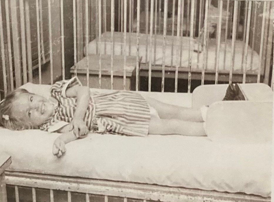 This photo of a little girl who was once a patient at the former polio hospital remains in a display at the Elks Camp.
